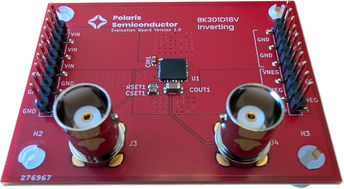 Red Polaris Semiconductor evaluation board labeled BK301D18V Inverting, with the regulator IC at its center, VIN and VNEG pin headers along the sides, and two BNC jacks at the front.